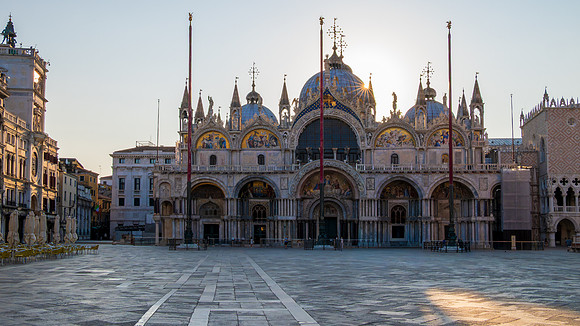St. Mark's Basilica in early morning with sunstar