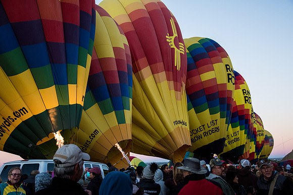 Riders wait while their balloons inflate